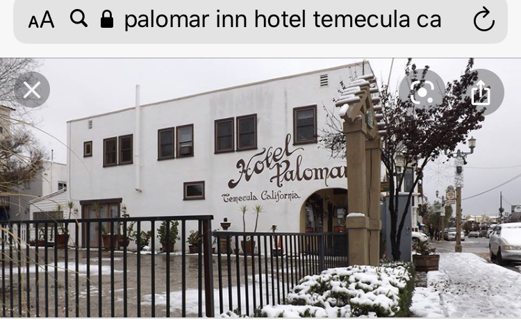 Guest room at the historic Palomar Inn in Old Town Temecula